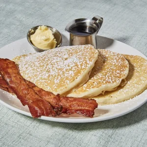 Buttermilk Pancakes (3) with 2 Bacon or 2 Sausages