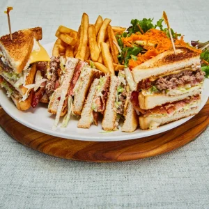 Trucker's Club with half salad & half fries